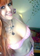 Busty Violet stripping on her webcam