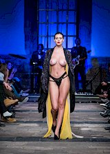 Topless model on runway