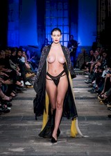 Topless model on runway