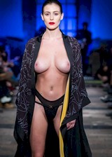 Topless model on runway