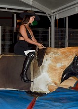 Demi Rose Mawby on a mechanical bull