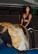 Demi Rose Mawby on a mechanical bull