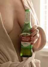 Busty babe having a beer