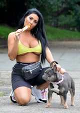 Busty girl walks her dog