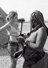 Topless white woman in Africa