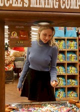 Braless girl in a grocery store