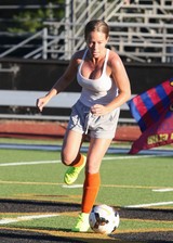 Busty babe playing Soccer