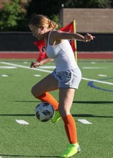 Busty babe playing Soccer