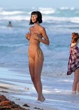 Nude girl at a public beach