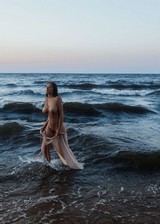 Busty and nude at the bech