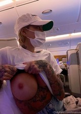 Tit flash on a plane