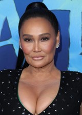 Tia Carrere big tits cleavage