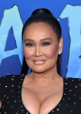 Tia Carrere big tits cleavage