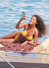Tina Kunakey in a bikini
