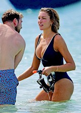 Zara McDermott tits in a swimsuit