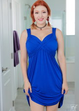 Busty Redhead In Blue Dress Goes Naked For Photoshoot
