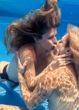 Busty Blondes Going Wild On Each Other In The Pool