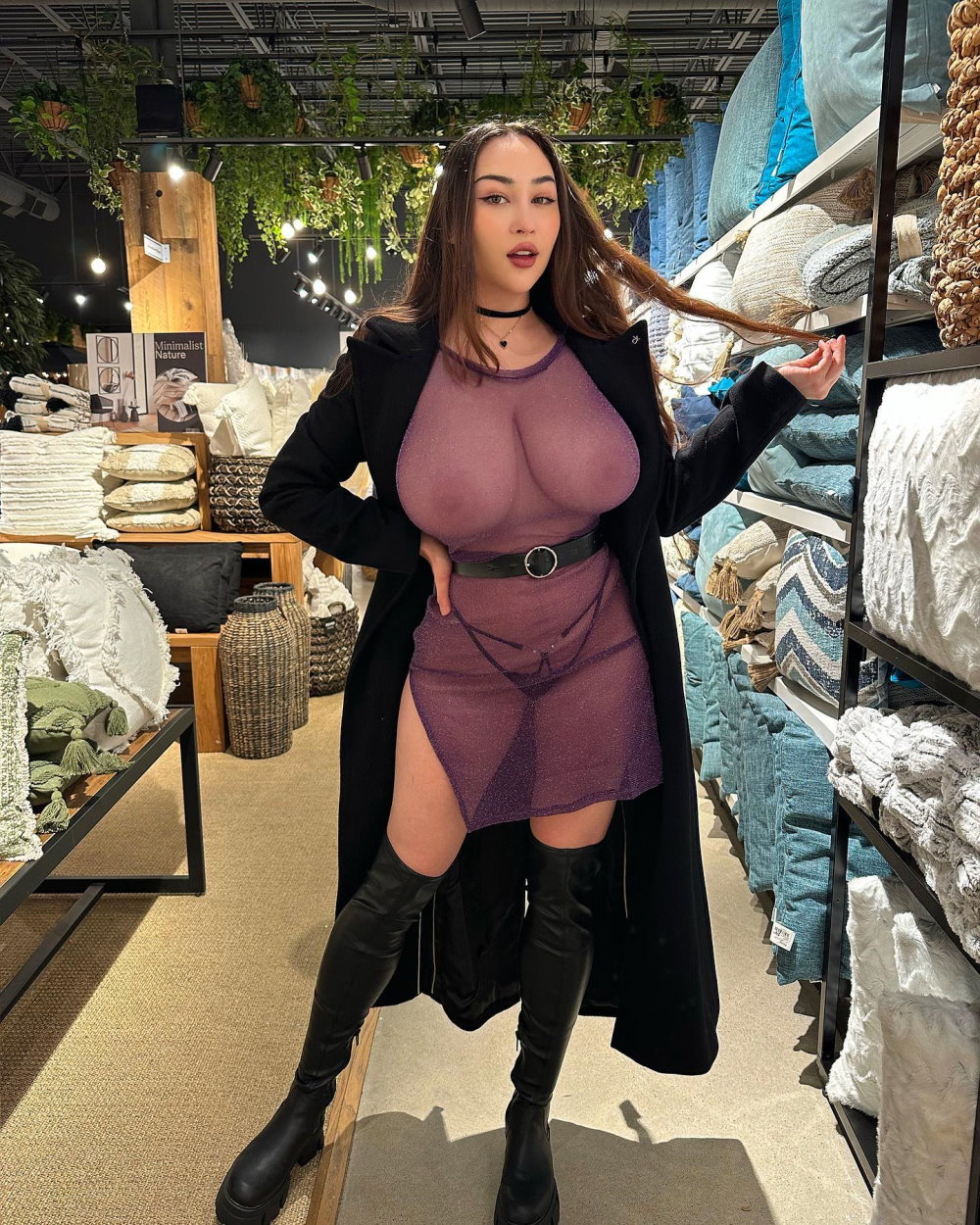 Louisa Khovanski wears a completely see through dress showing her knockers
