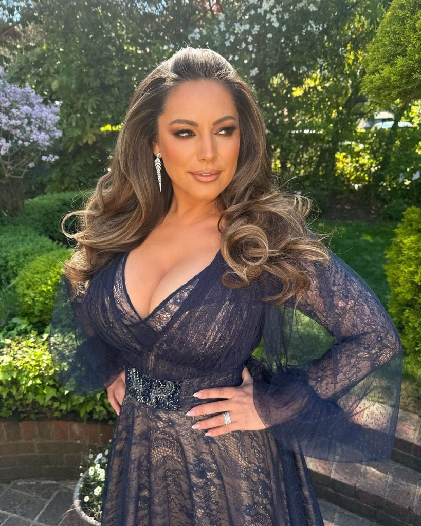 Kelly Brook big boobs cleavage in a blue dress