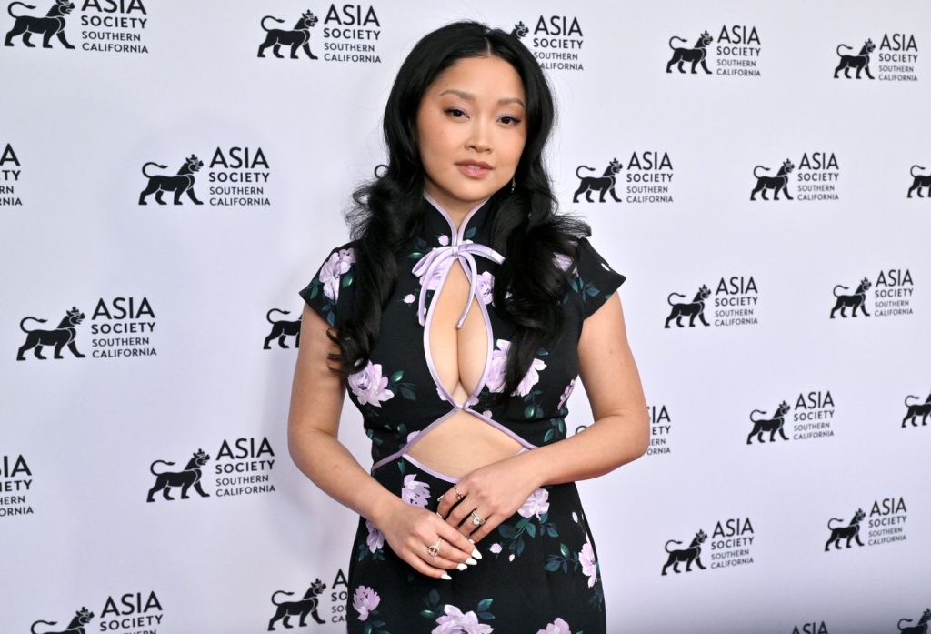 Big boob Asian actress attending a red carpet event