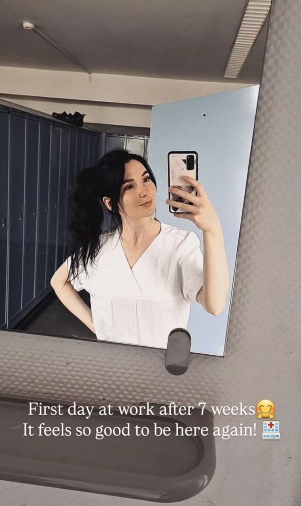 Pretty brunette snaps a selfie in the mirror