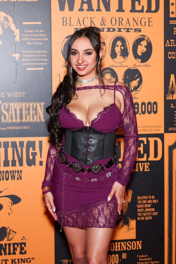 Porn star with big boobs showing cleavage on the red carpet