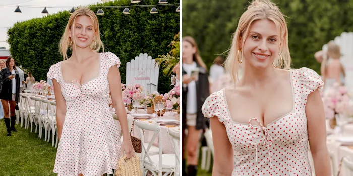 Busty blonde looking pretty in a summer dress