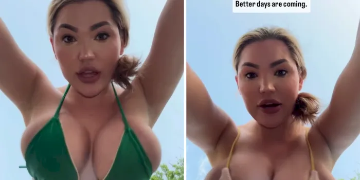 Big tit babe in bikinis hanging above her head