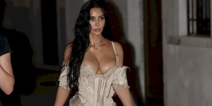 Kim Kardashian out in Venice and showing cleavage in a corset
