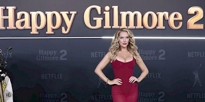 Paige Spiranac sexy in a red dress at a movie premiere