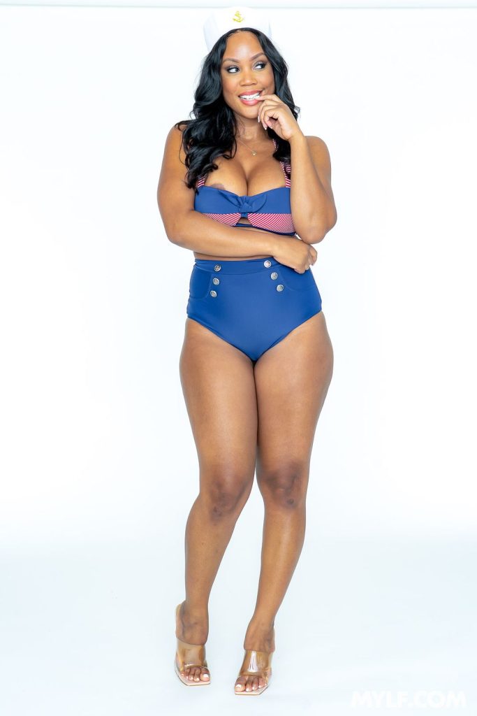 Sexy ebony sailor babe with a naughty look on her face