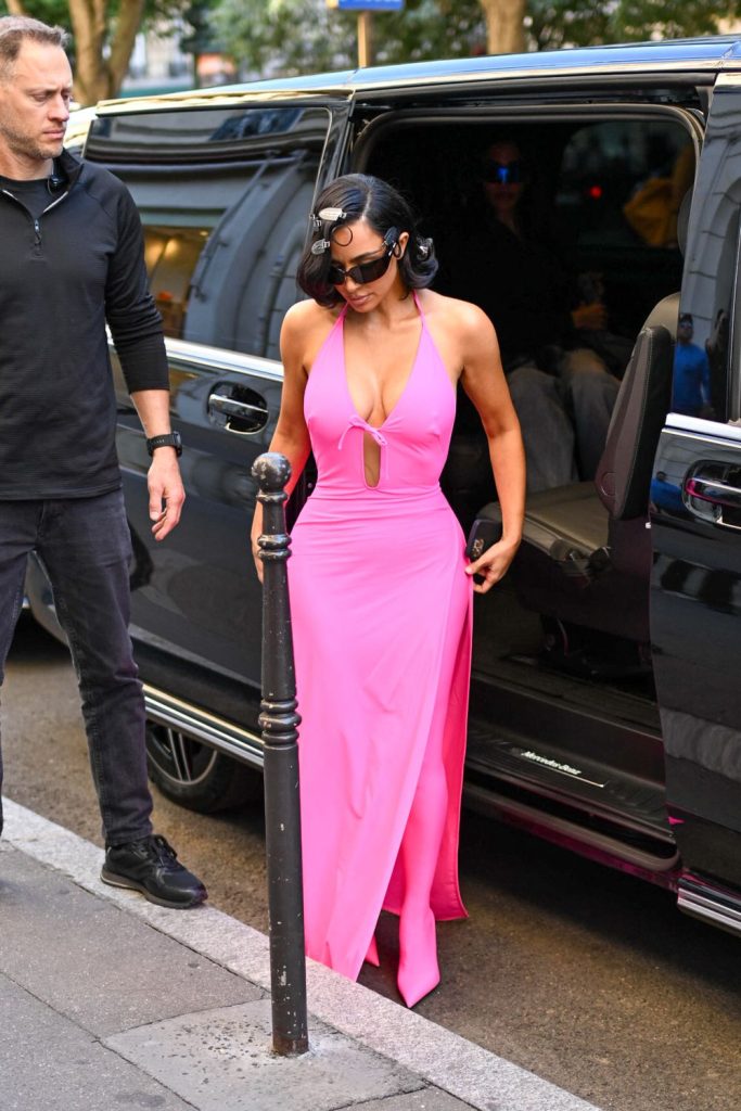 Kim Kardashian looking pretty and busty in a pink dress