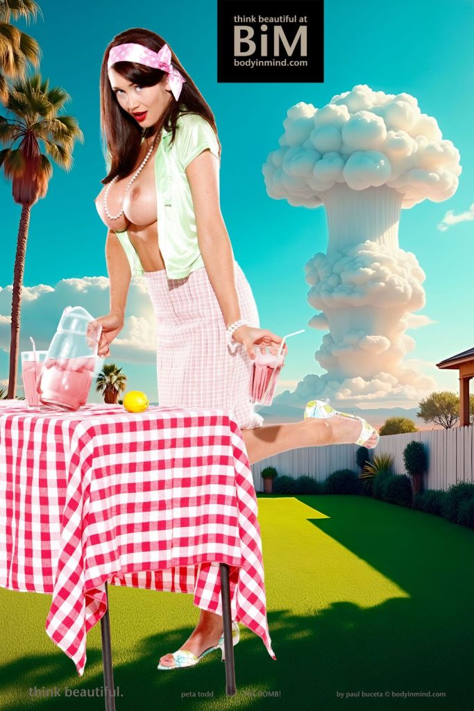 Peta Todd topless as a vintage pinup posing in front of a nuclear bomb