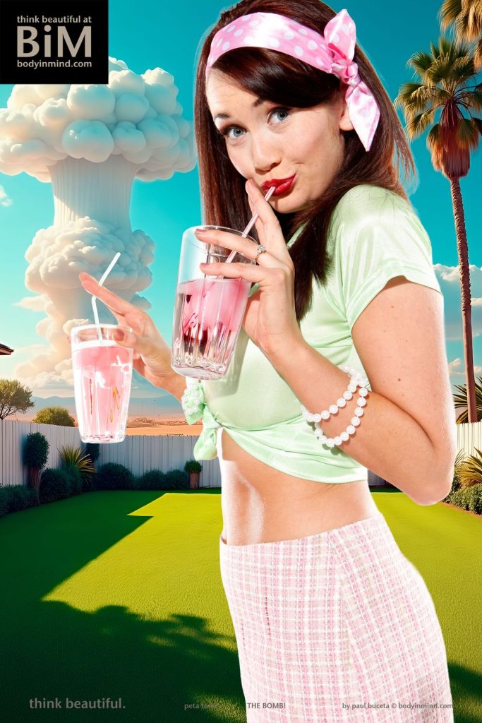Sexy pinup model takes a sip out of a drink in front of an exploding bomb