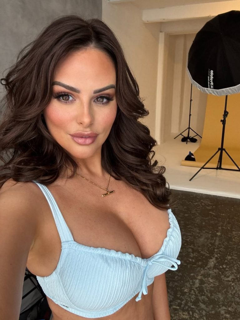 Rhian Sugden snaps a selfie of her new smaller boobs in a bra