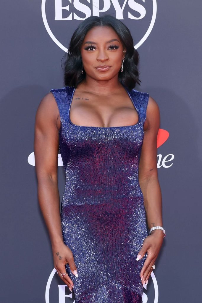 Close up of Simone Biles showing cleavage on the red carpet