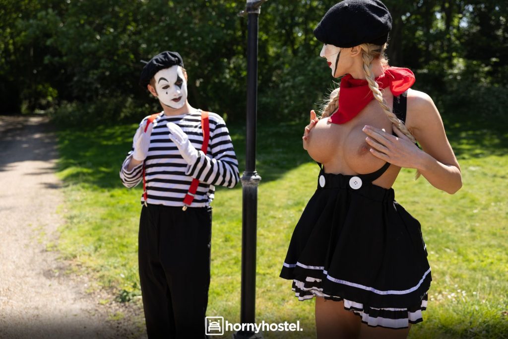 Blonde mime babe flashing her big boobs to a male mime in the park