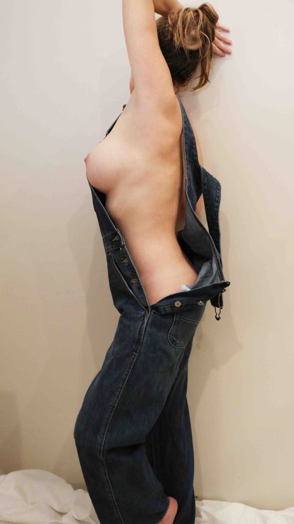 Sexy amateur wife teasing nude side boob in overalls