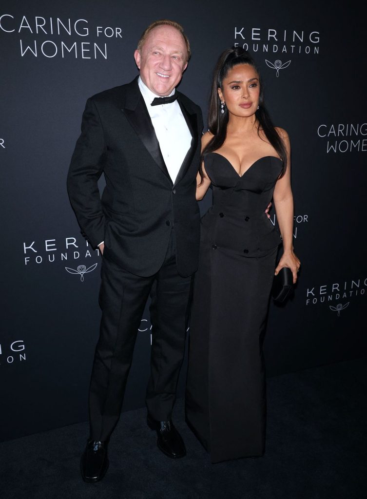Front view of Salma Hayek and her husband