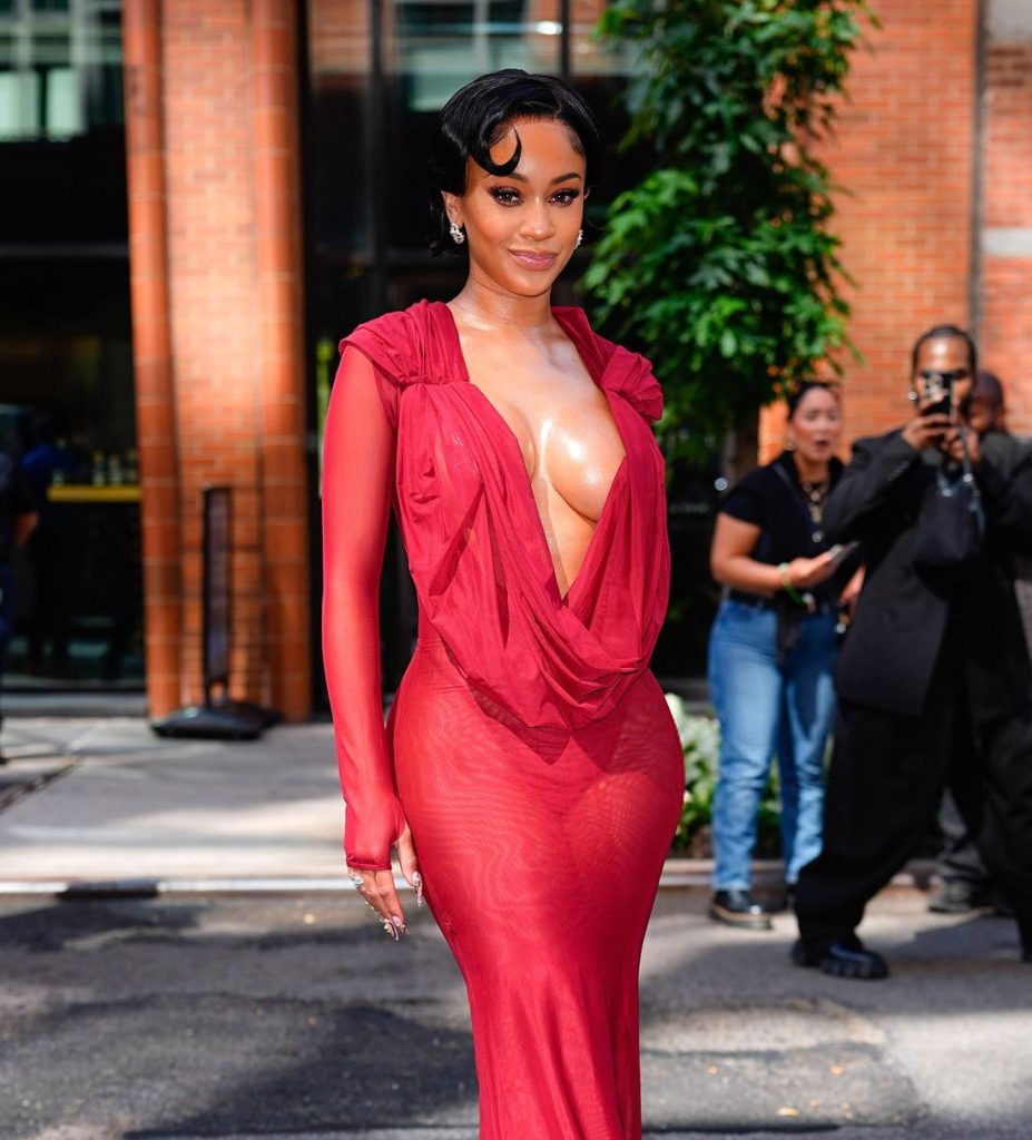 Close up view of Saweetie in the red dress