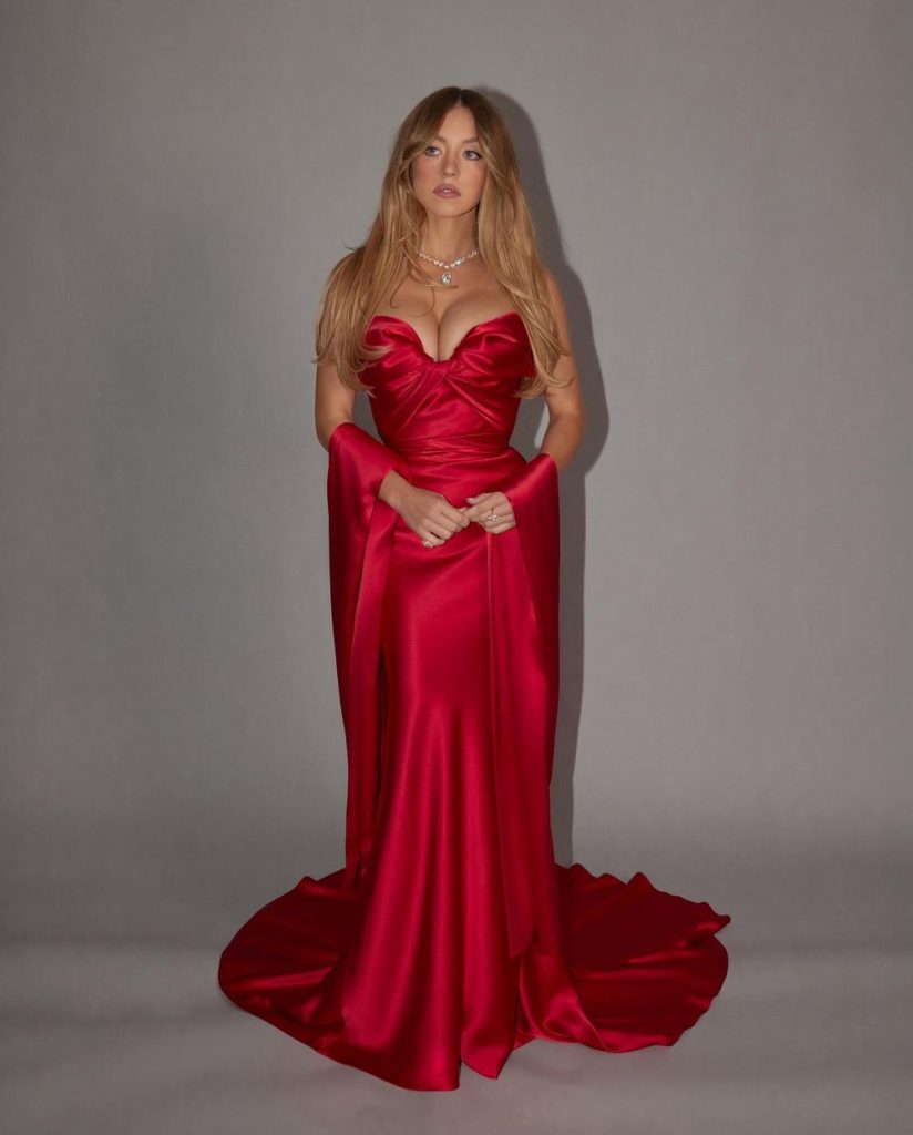 Sydney Sweeney in red with a slightly different facial expression