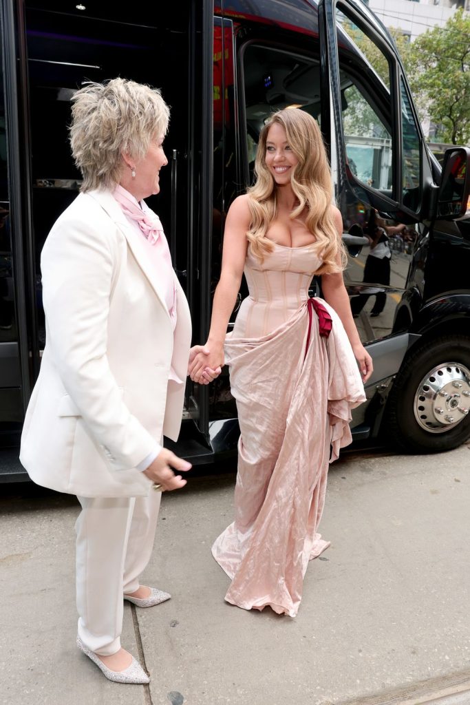 Sydney Sweeney and Christy Martin arriving to a red carpet movie premiere
