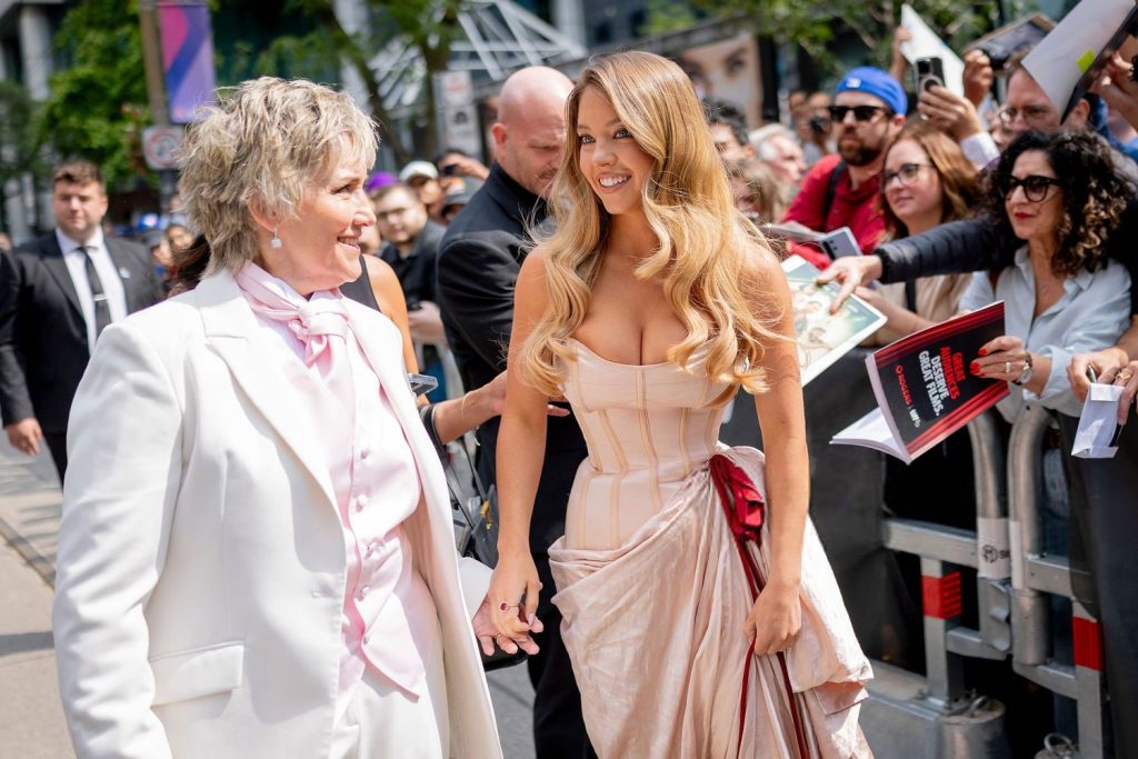 Sydney Sweeney and Christy Martin making the walk to the red carpet at TIFF