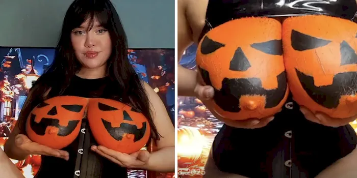 Big boob girl with her boobs painted like Halloween pumpkins