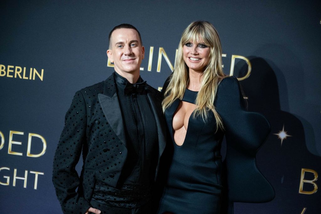 Close up of Heidi Klum and the man smiling