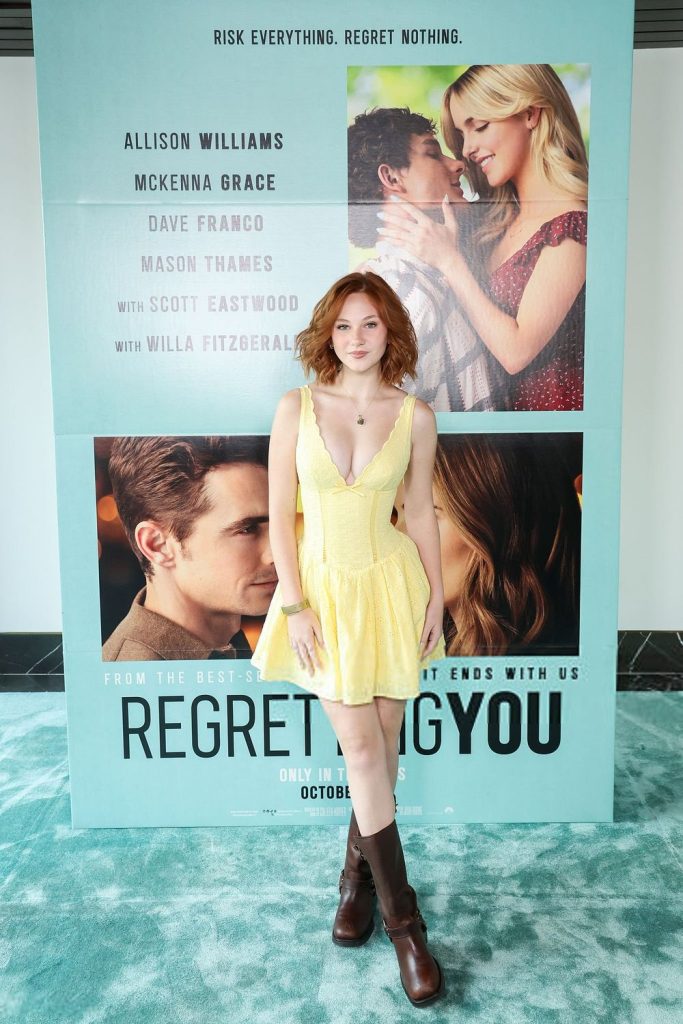 Further away view of Lily Brooks O'Briant in a yellow dress