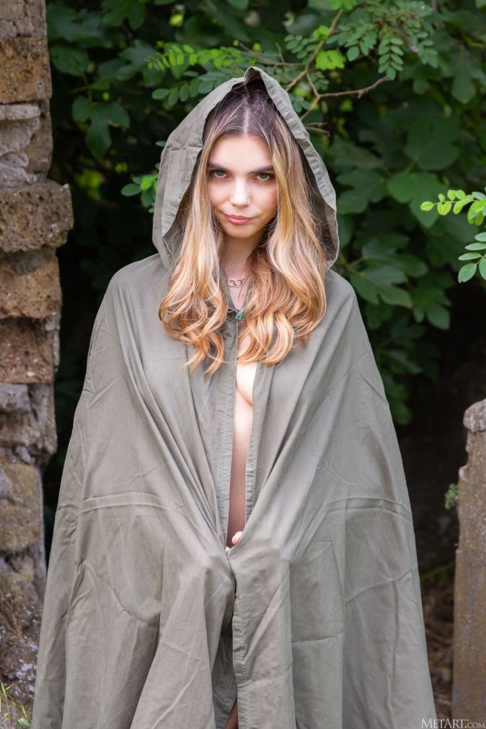 Close view of woman in a cape