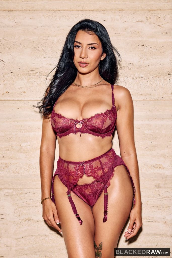 Frontal of Arab girl standing up wearing sexy underwear