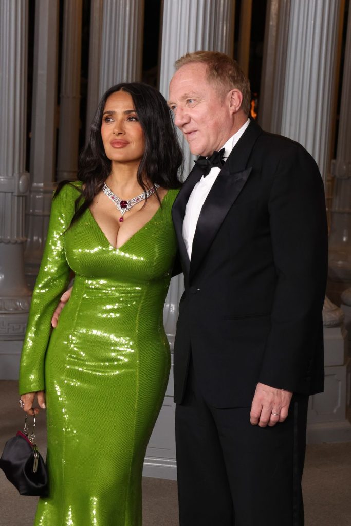 Close up of Salma Hayek and her husband posing