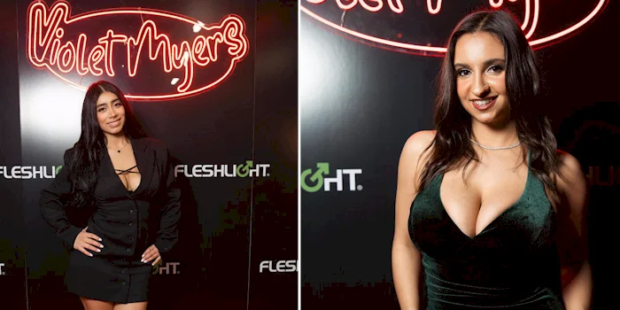 Two sexy porn stars posing on the red carpet